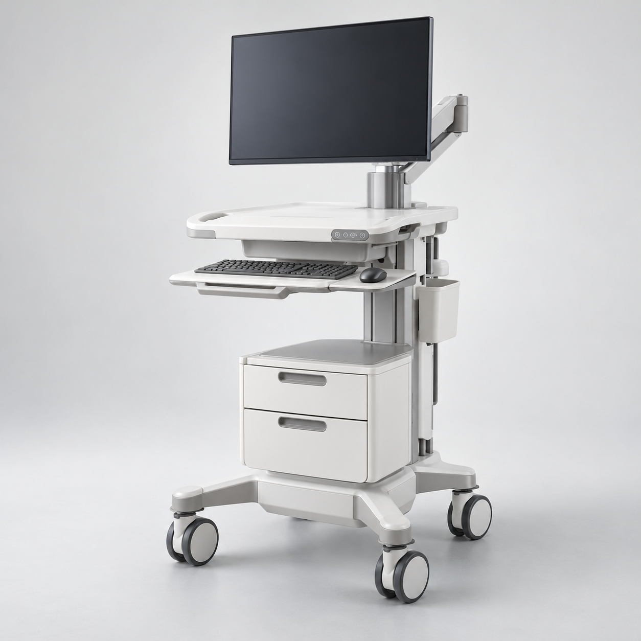 Powered mobile clinical workstation cart with adjustable monitor, keyboard tray, storage and caster base