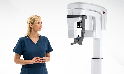 Carestream Dental CS 8100 panoramic X-ray imaging system with clinician, official manufacturer image