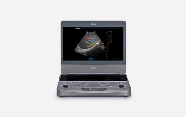 EDAN Acclarix AX8 portable ultrasound system with an image on the screen and a control panel