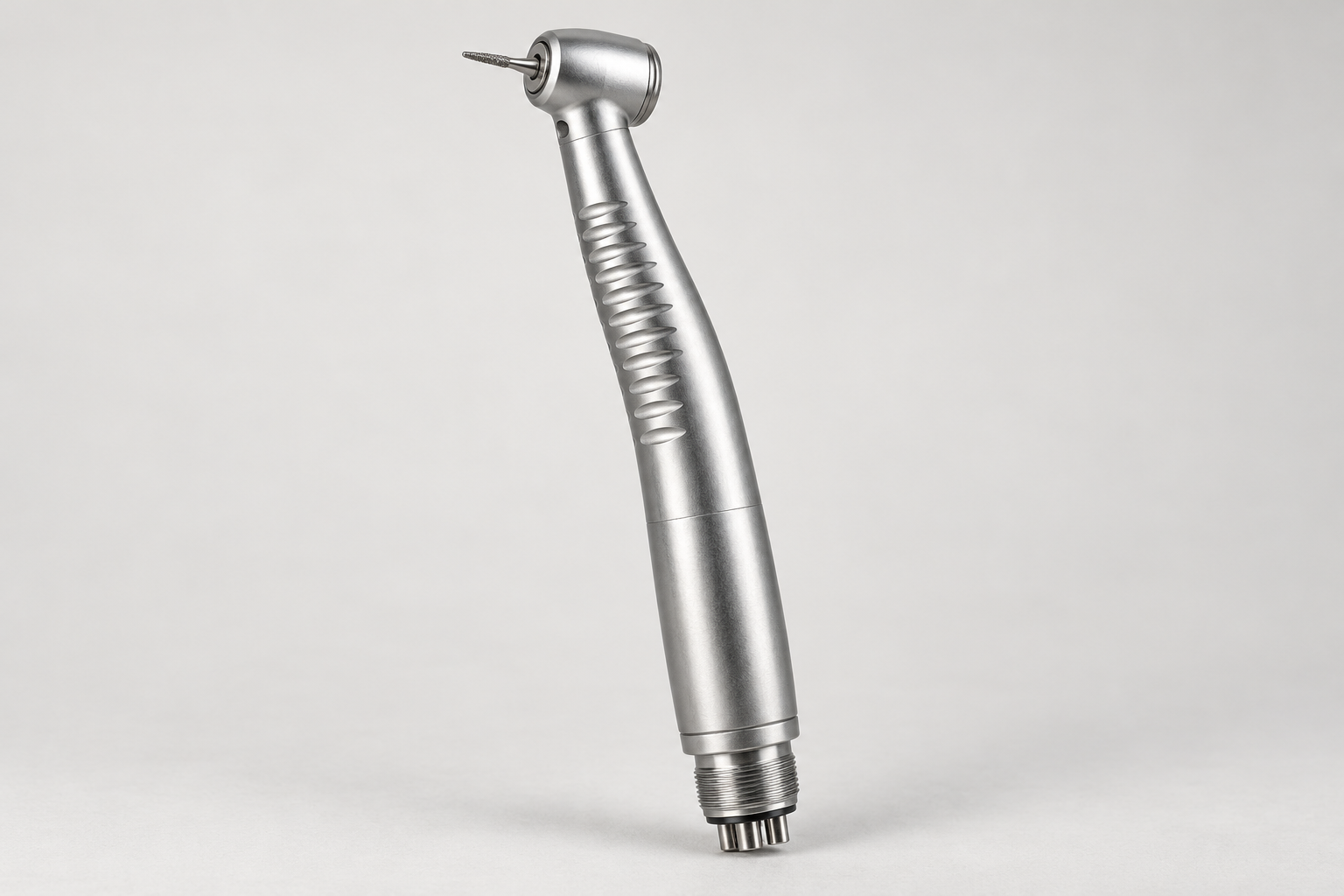 High-speed dental turbine handpiece with angled head and metal grip