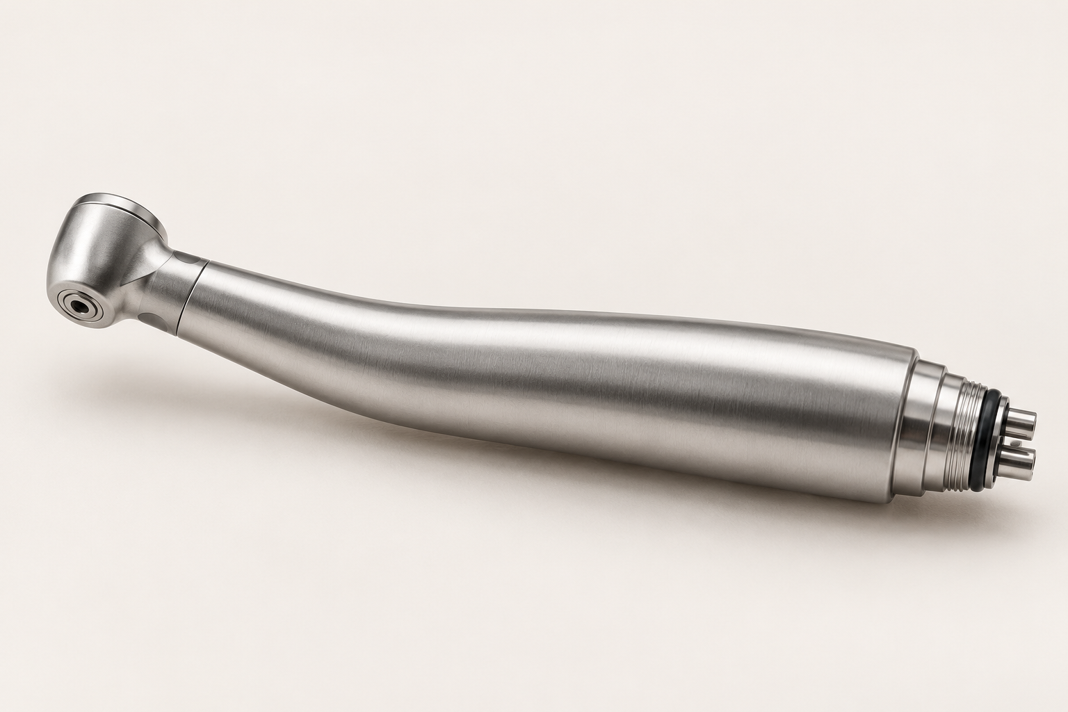 Stainless-steel high-speed dental turbine handpiece with angled head and rear coupling
